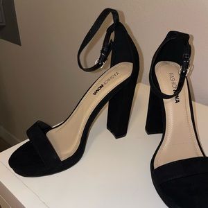 Black heels in box